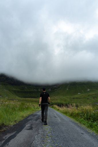 A man walking on Gleniff Horseshoe, Gleniff, County Sligo