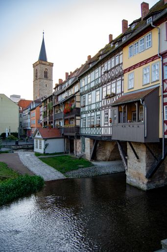 A vertical shot of the beautiful city of Erfurt, Germany with colorful buildings on top of the water