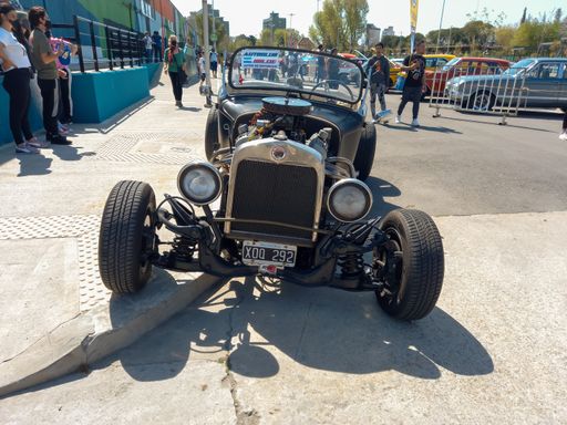 Hot rod. An old Ford classic car with engine and wheels modified to improve speed and acceleration for racing. Front view. Expo Fierros 2021