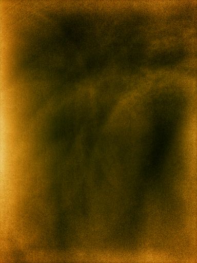 A vertical shot of a grainy yellow and black surface
