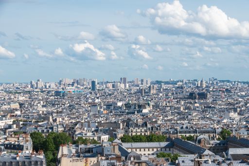 Paris city view from Montmartre  district in a day light. One can see many important buildings and monuments