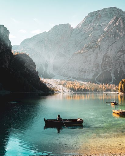 A vertical shot of a person sailing in Parco naturale di Fanes-Sennes-Braies Prags, Italy