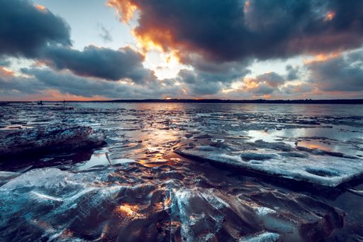 A scenic view of a sunset at the coast of the Baltic Sea, Lithuania
