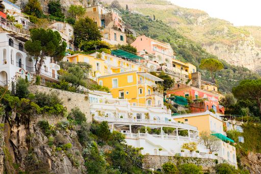 A low angle shot of the buildings and houses in Amalfi Coast captured in Italy