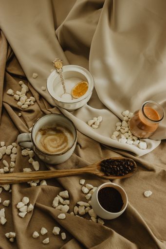 A vertical shot of varied Mediterranean breakfast of coffee beans