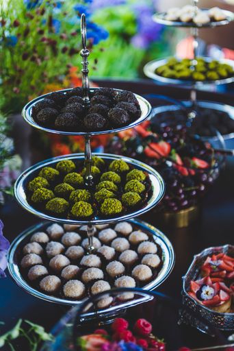 A vertical shot of various types of sweets and candy on a table