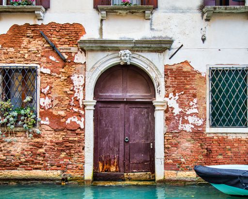 The beautiful facade of an old house captured in Saint Marks Square, Venice, Italy