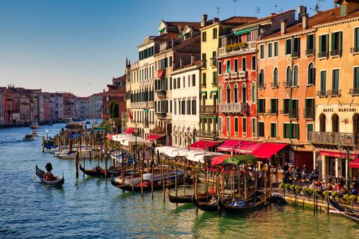 A beautiful view of the Grand Canal in Venice, Italy captured from a bridge over the canal