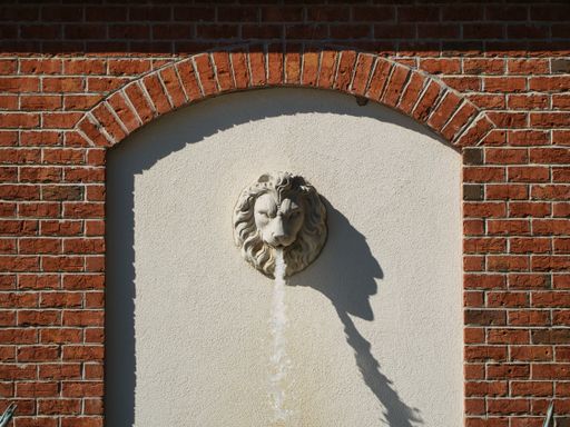 A lion mascaron in Omaha's Henry Doorly Zoo and Aquarium in Omaha Nebraska