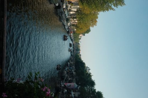 A vertical shot of the Amsterdam Canal 2021