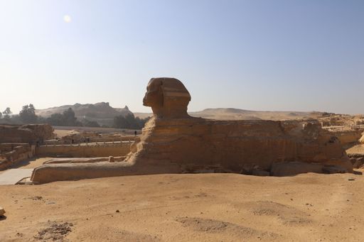 The Great Sphinx of Giza under a clear blue sky, showcasing ancient Egyptian architecture.