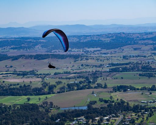 A top view of the para-gliding on Mount Tambourine on a valley's landscape