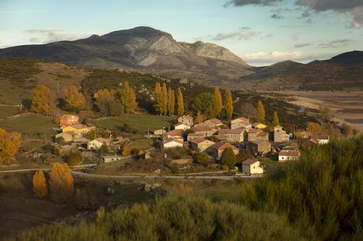 A high angle shot of the village houses among the mountains captured in Palencia, Spain
