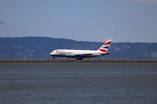 British Airways A380 touching down at San Francisco International Airport with the Diablo mountain range in the background, coming in from London