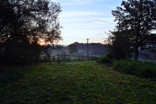 A misty landscape early in the morning in Saint-Cyr, Haute Vienne, France