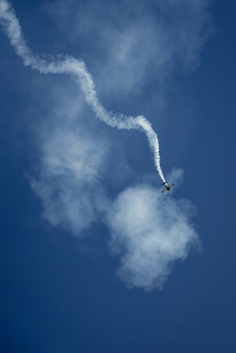 A fascinating shot of an aircraft flying high in the blue sky