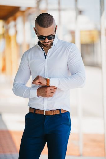 A vertical shot of a young caucasian businessman