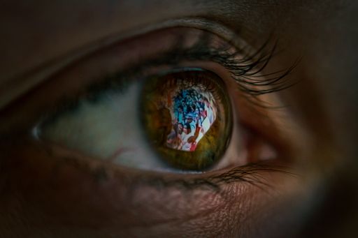 The beautiful closeup shot of the eye reflection