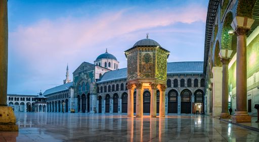 day panoramic view of the Umayyad mosque during a sunset. showing the Islamic architecture and Islamic art in this holy place in Damascus Syria.