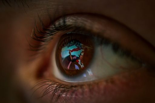 The beautiful closeup shot of the eye reflection