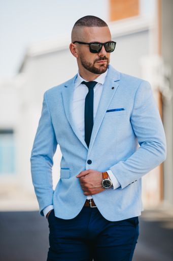 A vertical shot of a young caucasian businessman
