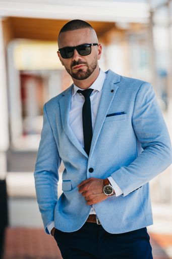 A vertical shot of a young caucasian businessman