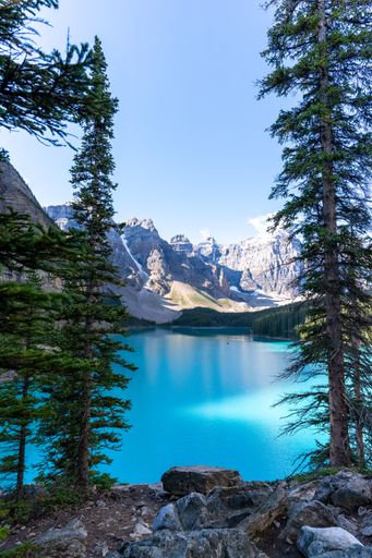 A mesmerizing view of Moraine Lake in Banff national park in Canada with mountains in the background