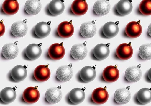 A collection of Christmas baubles on white background