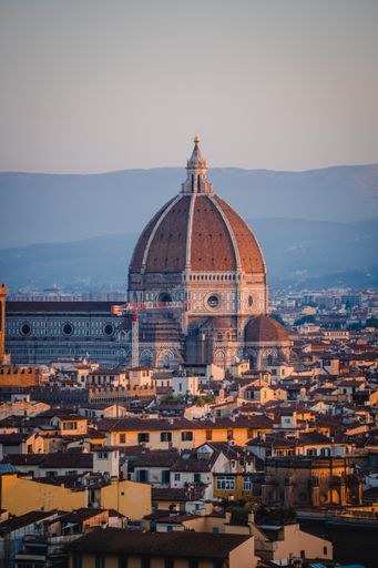 A vertical shot of the Cathedral of Santa Maria del Fiore and other buildings in Florence, Italy
