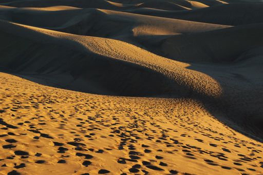 A scenic view of a sunrise in Maspalomas Beach, Gran Canaria, Spain