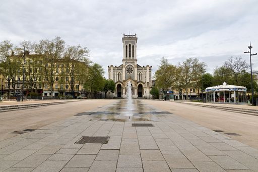 The historic Saint-Etienne Cathedral with a fountain in a European city square