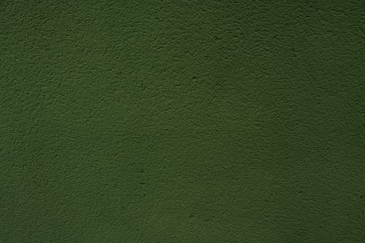 Background of green house exterior colored coating wall texture horizontal photo. Coating pattern, textures and backgrounds