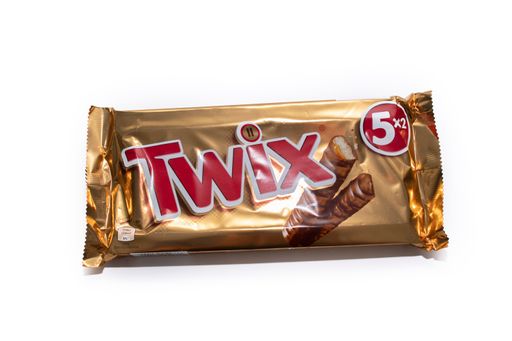 A Twix caramel shortbread chocolate bar isolated on white background