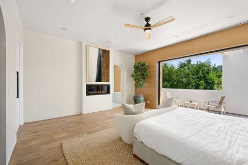Elegant modern home featuring open-concept design, high-end finishes, and expansive indoor-outdoor spaces
