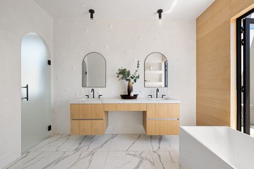 Elegant modern home featuring open-concept design, high-end finishes, and expansive indoor-outdoor spaces