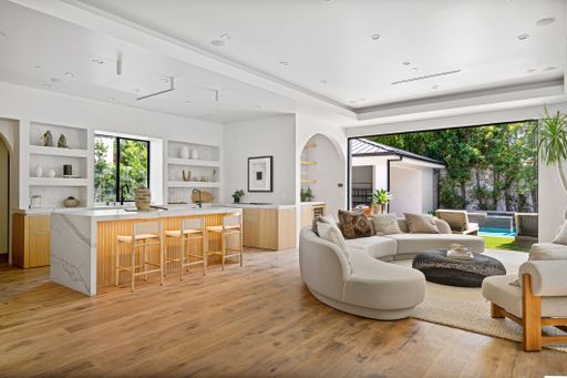 Elegant modern home featuring open-concept design, high-end finishes, and expansive indoor-outdoor spaces