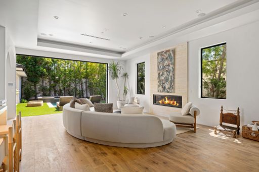 Elegant modern home featuring open-concept design, high-end finishes, and expansive indoor-outdoor spaces