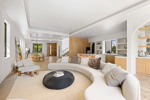 Elegant modern home featuring open-concept design, high-end finishes, and expansive indoor-outdoor spaces