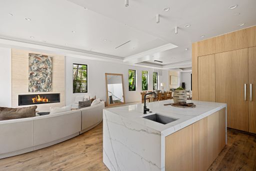Elegant modern home featuring open-concept design, high-end finishes, and expansive indoor-outdoor spaces