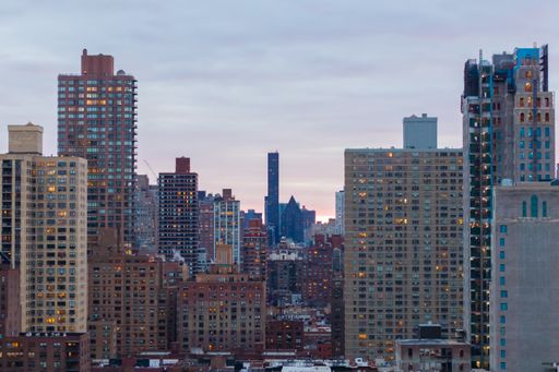 An amazing view of the New-York cityscape on a beautiful sunrise background