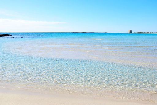 turquoise water and white sandy beach in Salento, Italy