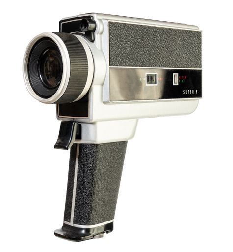 Vintage super 8 film camera isolated on white background