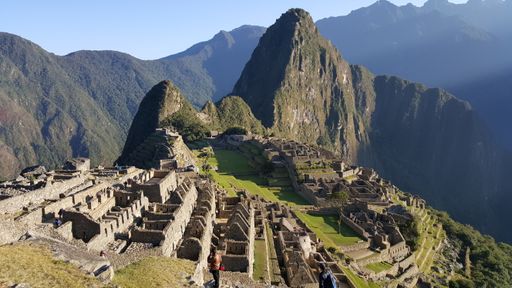 A scenic view of ancient ruins Inca city of Machu Picchu in the Andes in Peru.