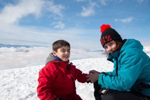 The Portrait of mother and son in cold weather in the snow