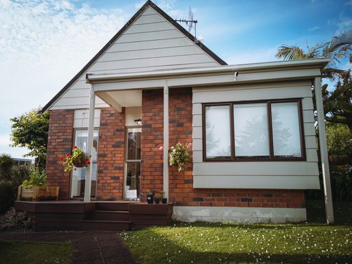 A modern suburban house with a garden on a sunny day in Howick, Auckland, New Zealand