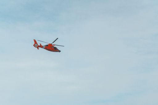 A helicopter flying in the sky over Las Vegas