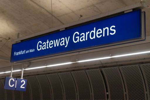 Gateway Gardens underground railway station sign on the blue screen, Frankfurt am Main