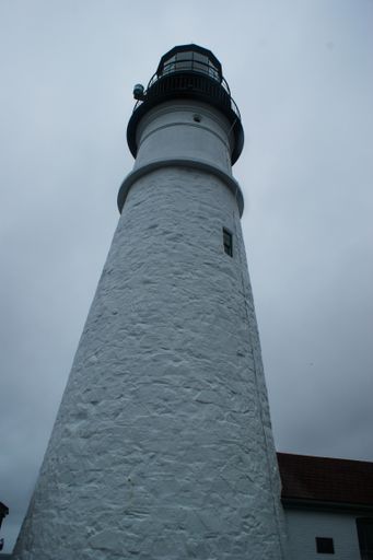 A vertical low angle shot of Portland Head Light. Portland, United States.