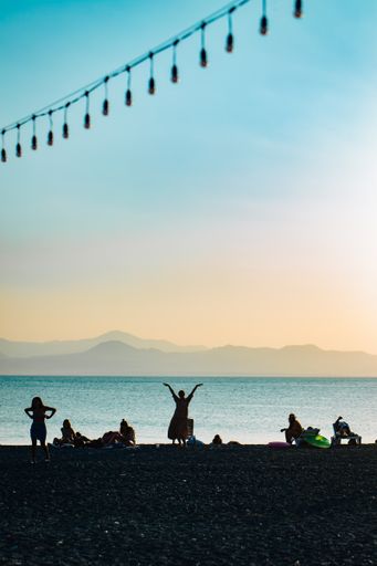 A group of young women enjoying themselves on the shore of Lake Sevan, Armenia