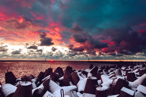 A mesmerizing shot of the beautiful sunset sky over the port of Klaipeda, Lithuania